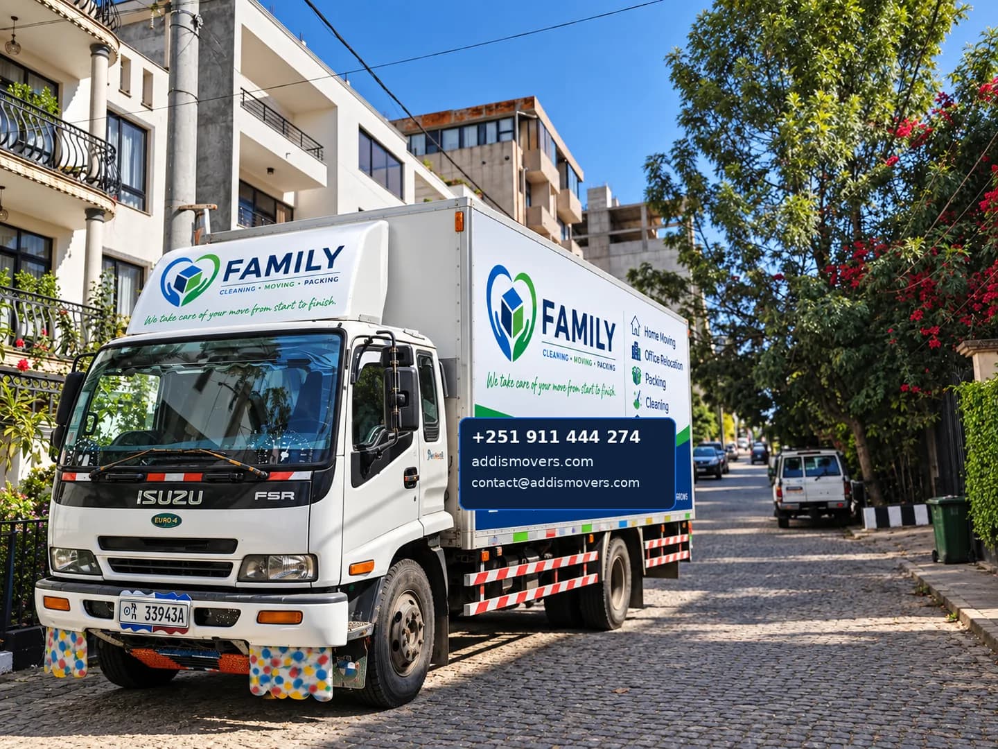 FAMILY branded moving truck on a residential street in Addis Ababa